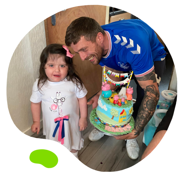 Emily & dad with birthday cake